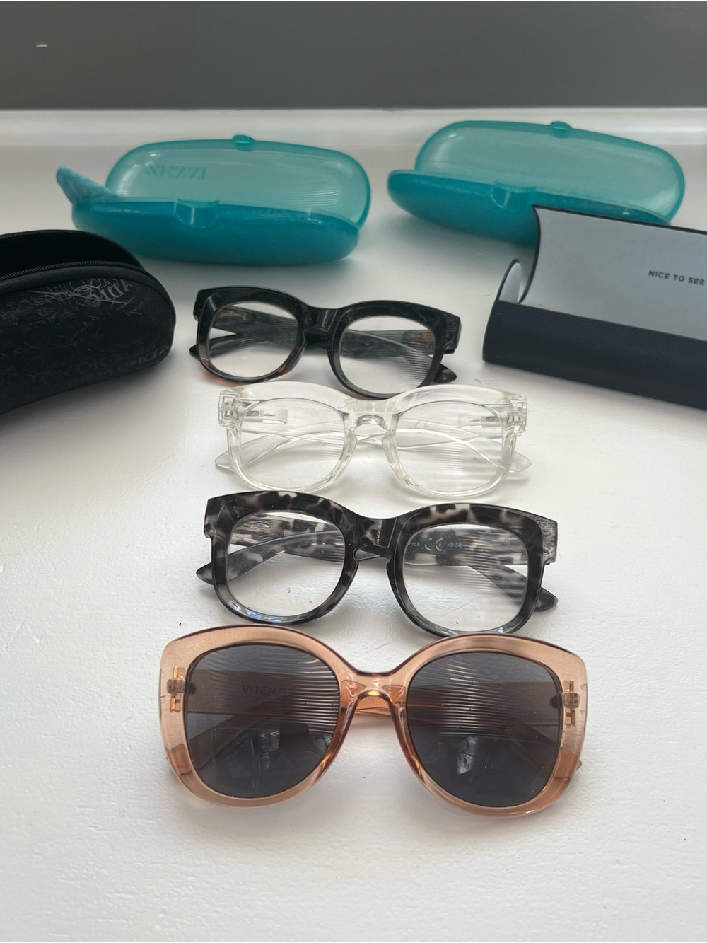 Stylish Women's Oversized Readers and a Pair of Sunglasses -